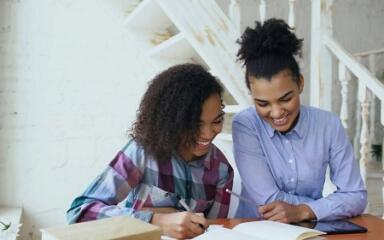 mom and girl smiling